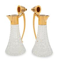 A Pair of English Silver-Gilt Mounted Cut Glass Decanters