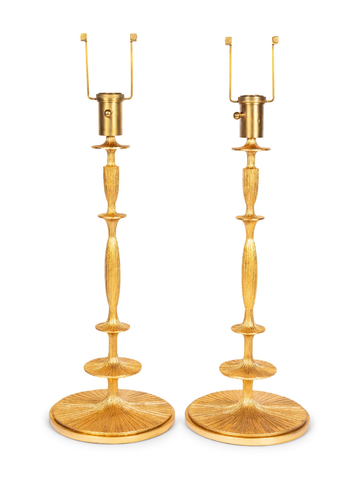A Pair of Gilt Resin Table Lamps with Shades
