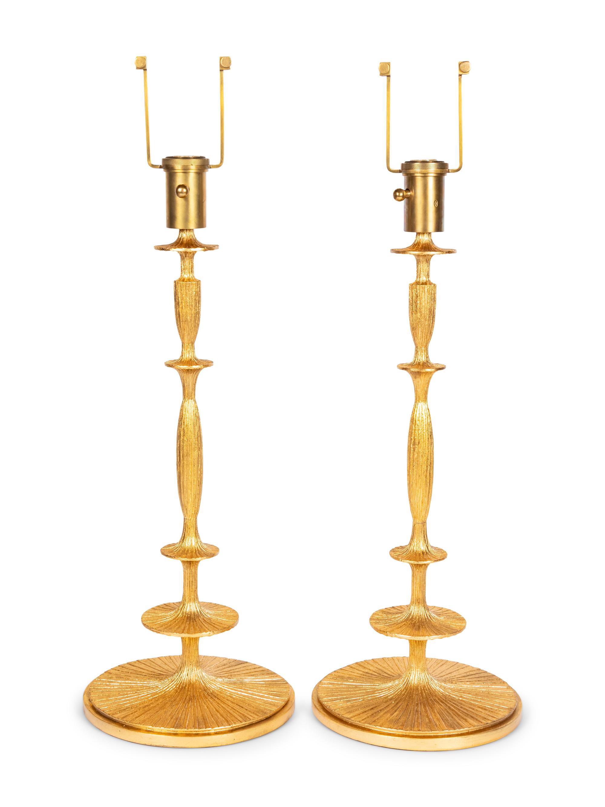 A Pair of Gilt Resin Table Lamps with Shades