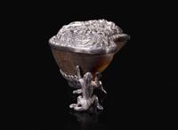 An unusual Indian silver-mounted buffalo horn box 印度嵌銀牛角盒
