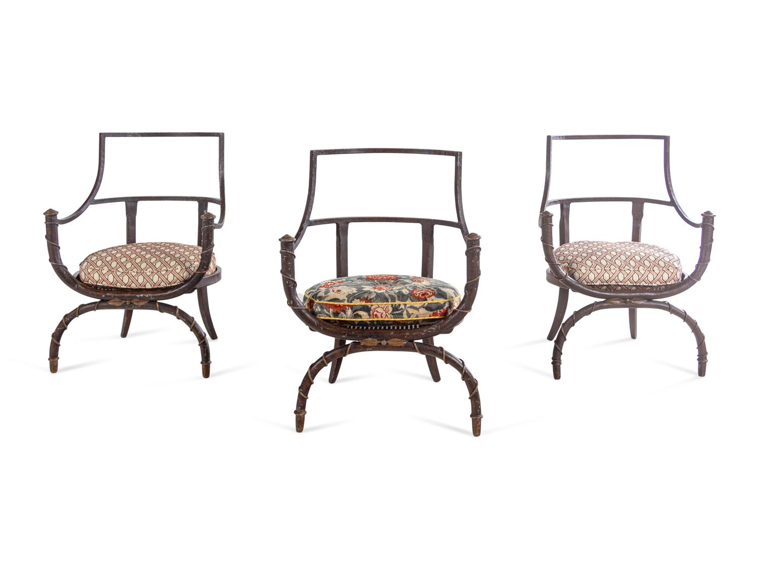 A Set of Three Painted Metal Curule Armchairs