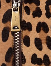 Two Designer Pony Hair Bags: One Céline Leopard Print Tote and One Prada Animal Print Clutch