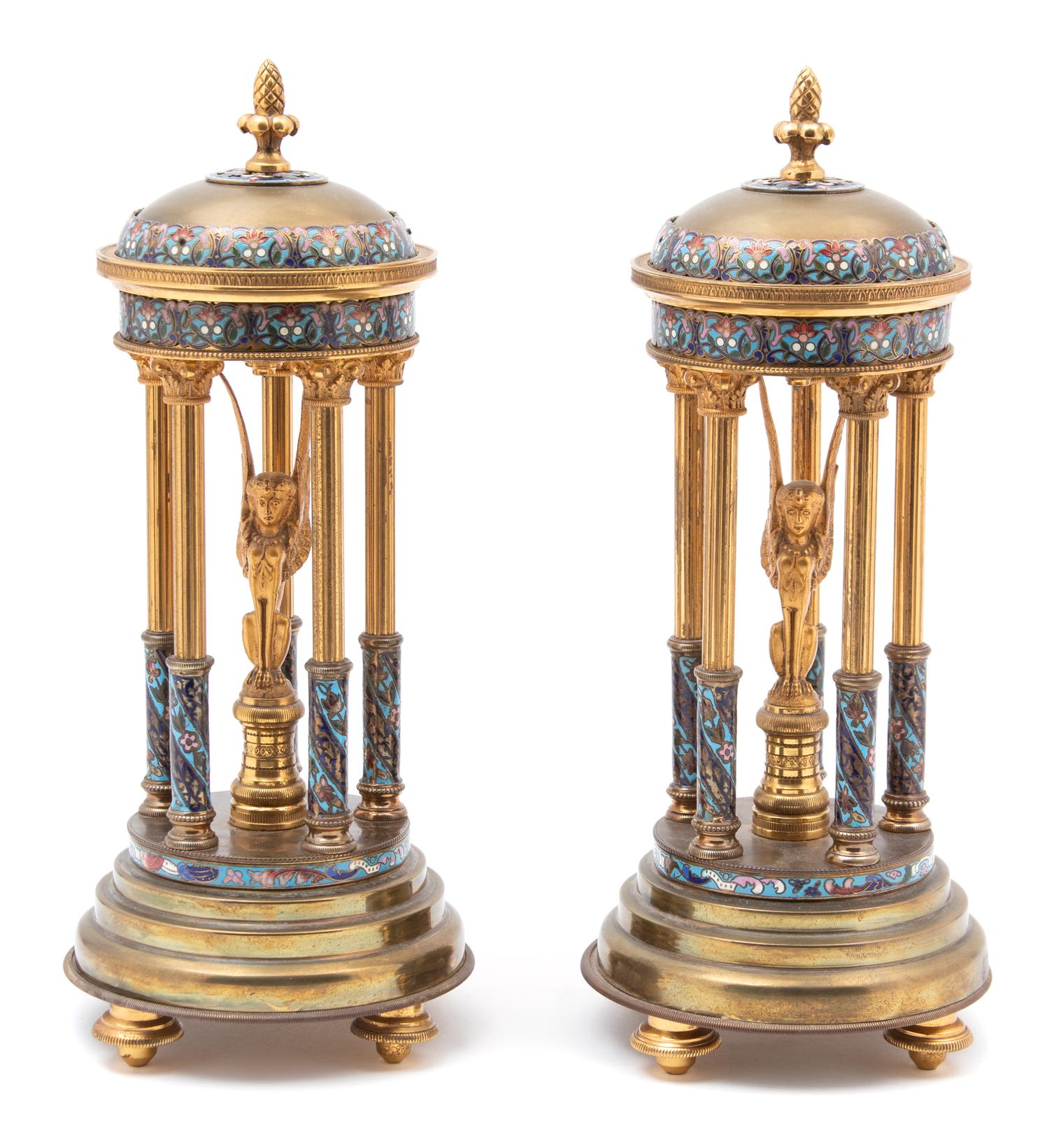 A Pair of French Champleve Enamel and Gilt Bronze Stands with Interior Sphinx Height 11 x diameter 4 1/2 inches. — LATE 19TH/EARLY 20TH CENTURY