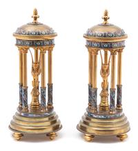 A Pair of French Champleve Enamel and Gilt Bronze Stands with Interior Sphinx Height 11 x diameter 4 1/2 inches. — LATE 19TH/EARLY 20TH CENTURY