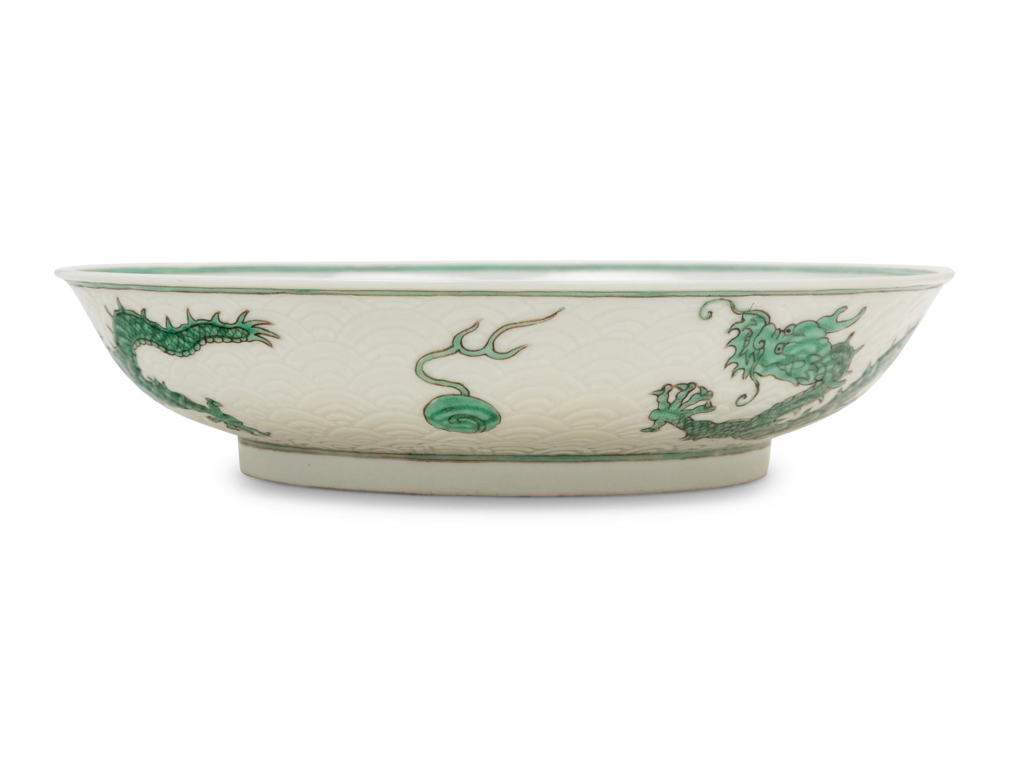 A Green Enameled White Ground Porcelain 'Dragon' Dish