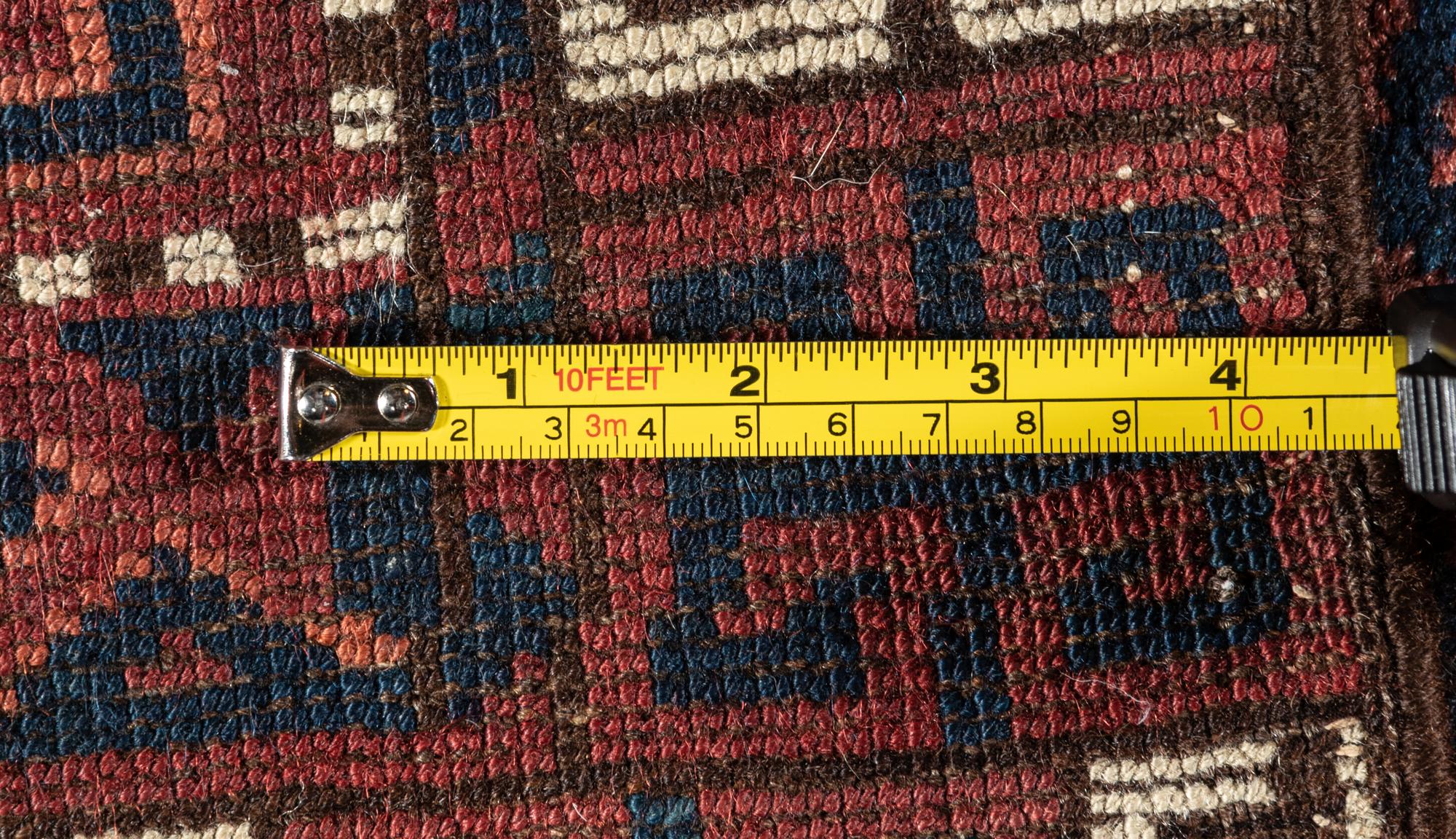 A Turkoman Hatchli Wool Rug