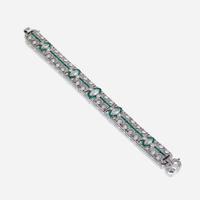 An Art Deco diamond, emerald, and platinum bracelet