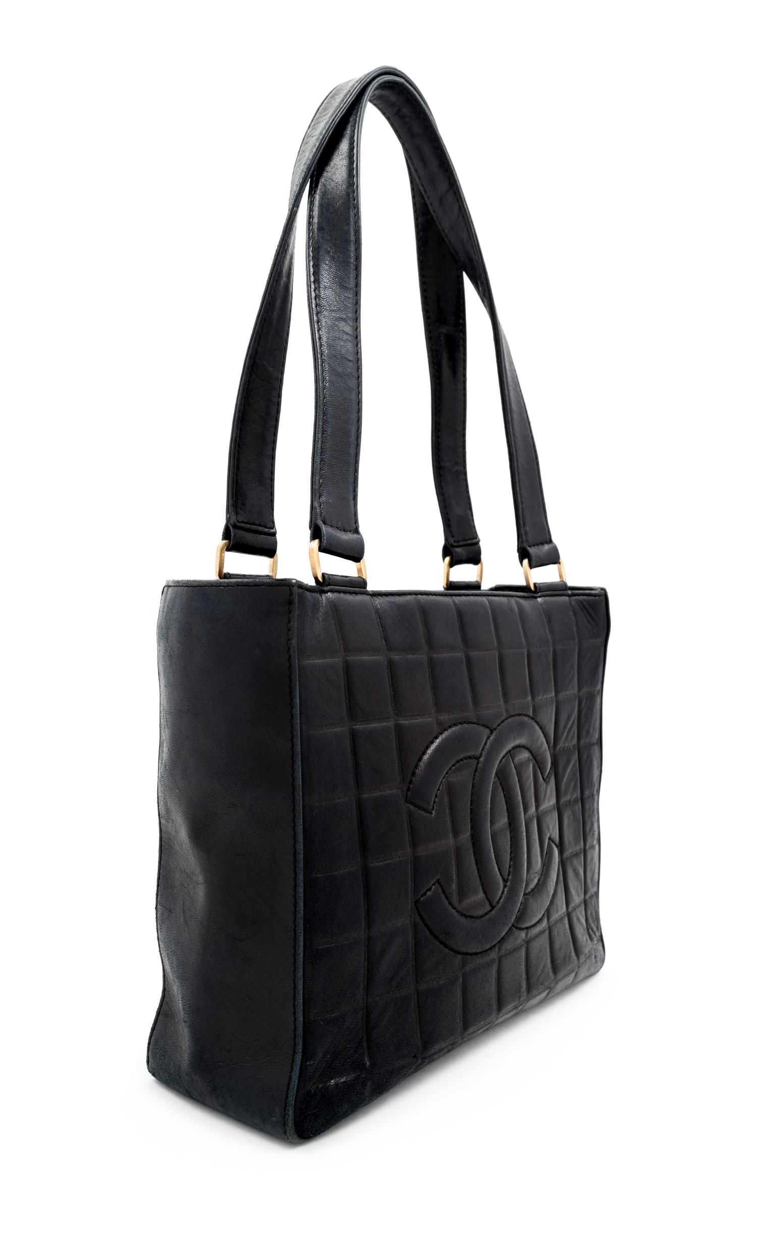 A Chanel Black Lambskin "Chocolate Bar" Tote, 8" H x 10" W x 3.25" D; Strap drop: 9".