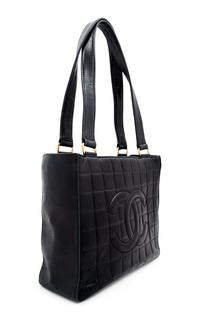 A Chanel Black Lambskin "Chocolate Bar" Tote, 8" H x 10" W x 3.25" D; Strap drop: 9".