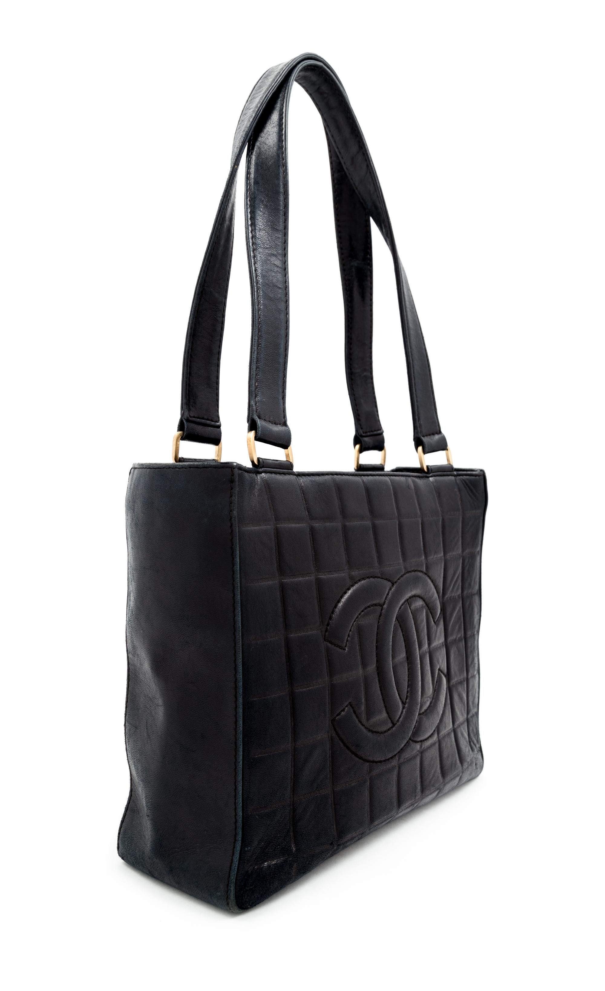A Chanel Black Lambskin "Chocolate Bar" Tote, 8" H x 10" W x 3.25" D; Strap drop: 9".