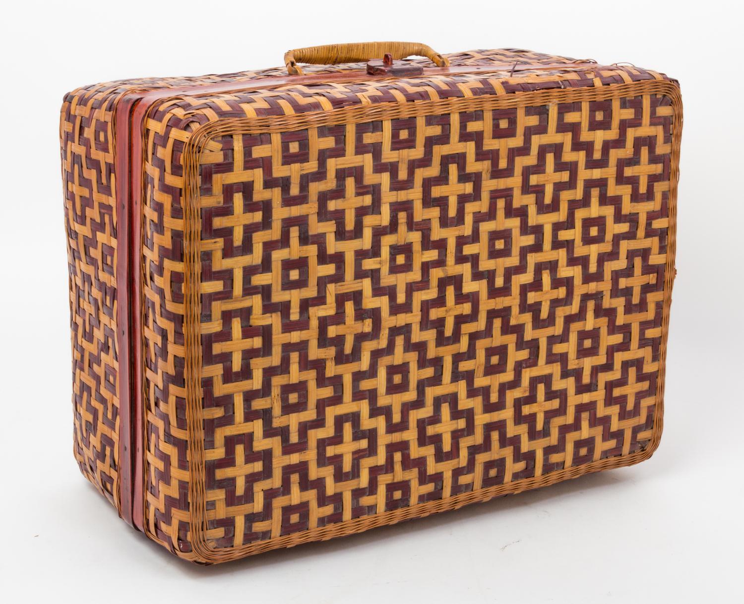 A Woven Reed Suitcase Height 8 x width 16 1/2 inches.