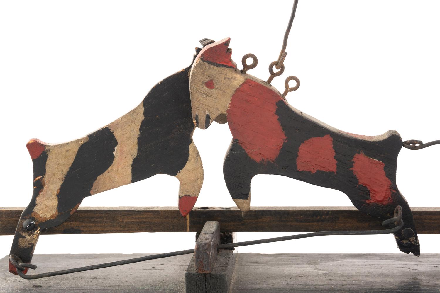 A Carved and Painted Whirligig