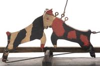 A Carved and Painted Whirligig