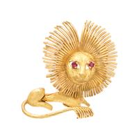 FRENCH, YELLOW GOLD AND RUBY LION BROOCH