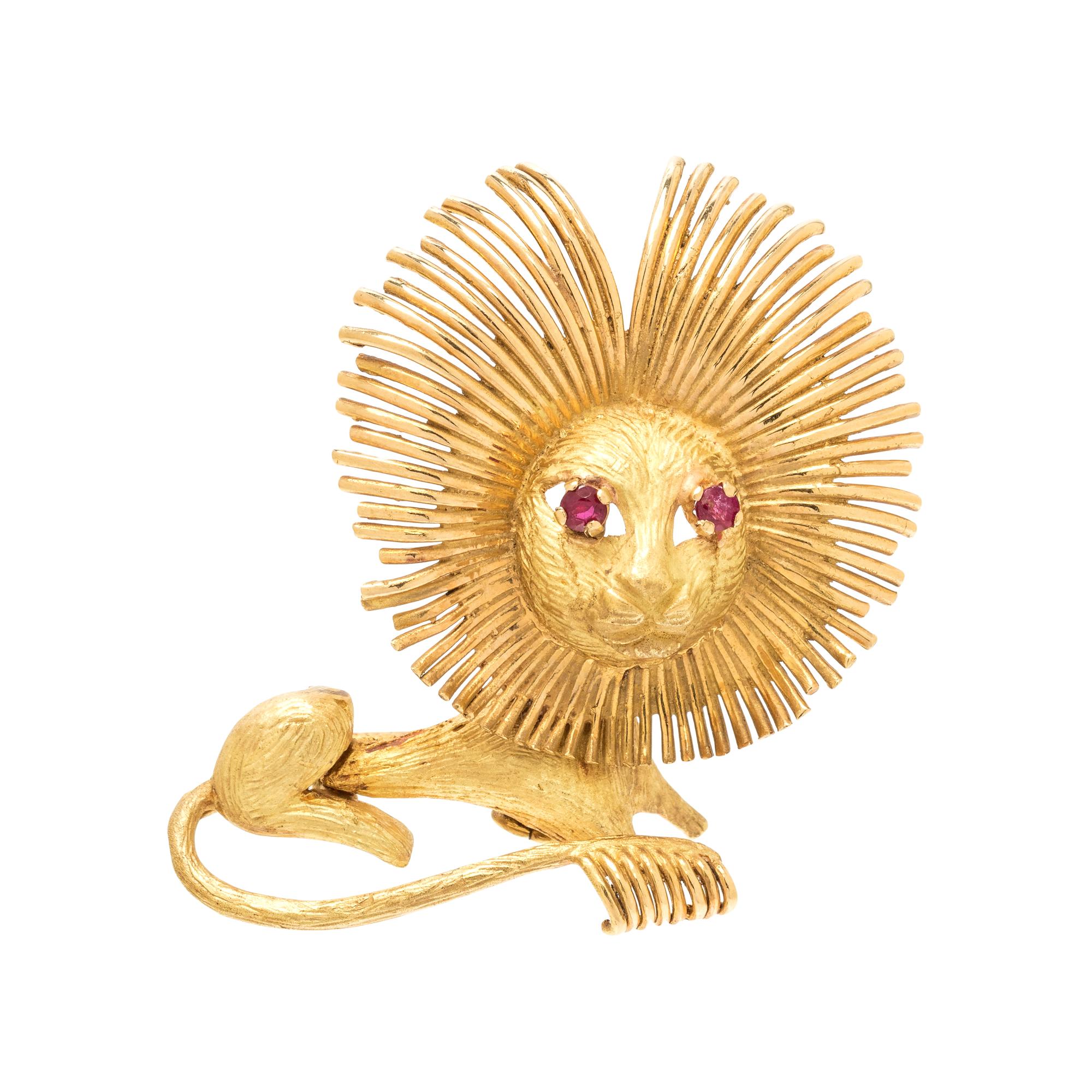 FRENCH, YELLOW GOLD AND RUBY LION BROOCH