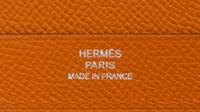 An Hermes Orange Leather Folio, 9" x 12.5" x .25".