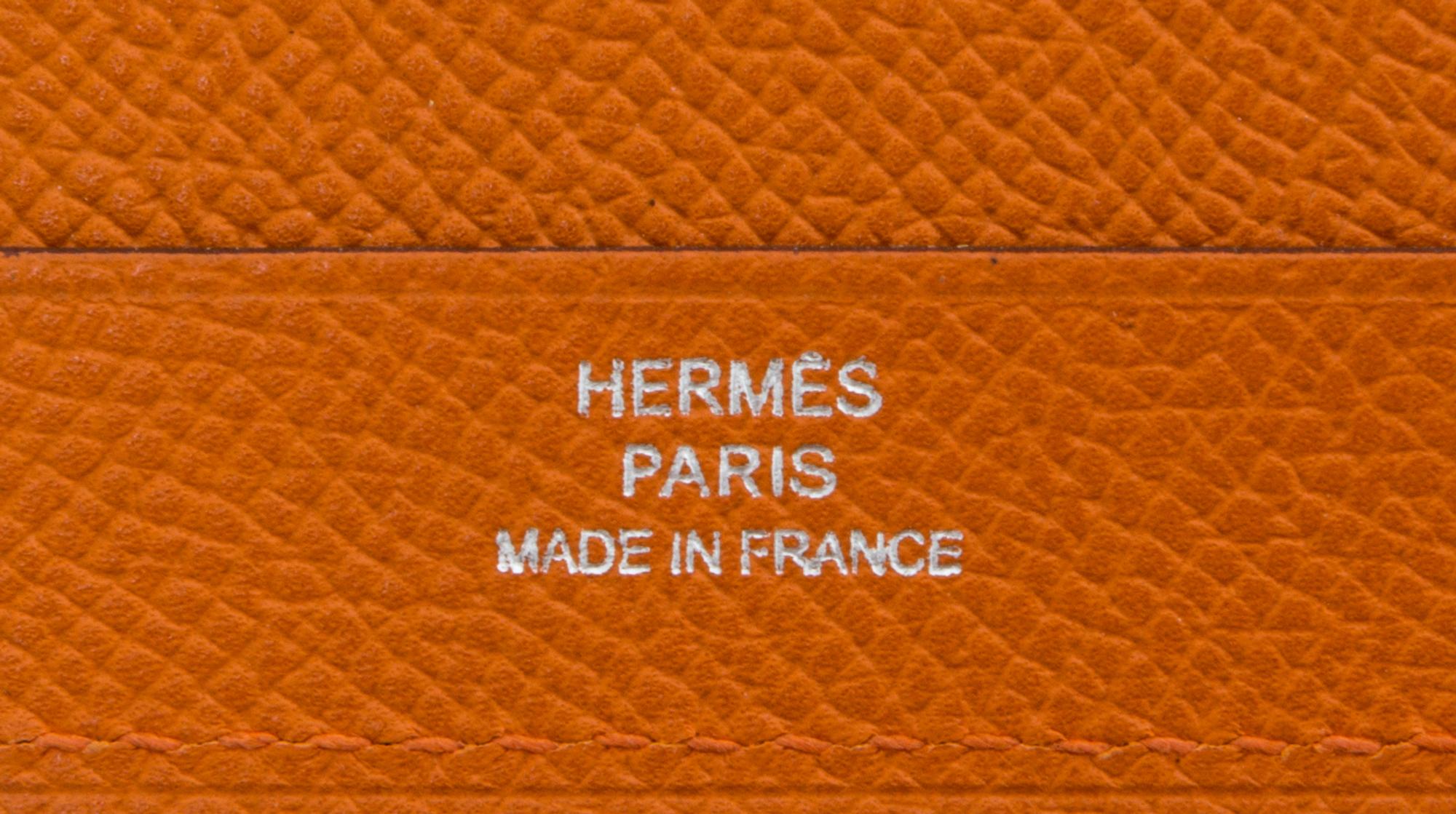 An Hermes Orange Leather Folio, 9" x 12.5" x .25".