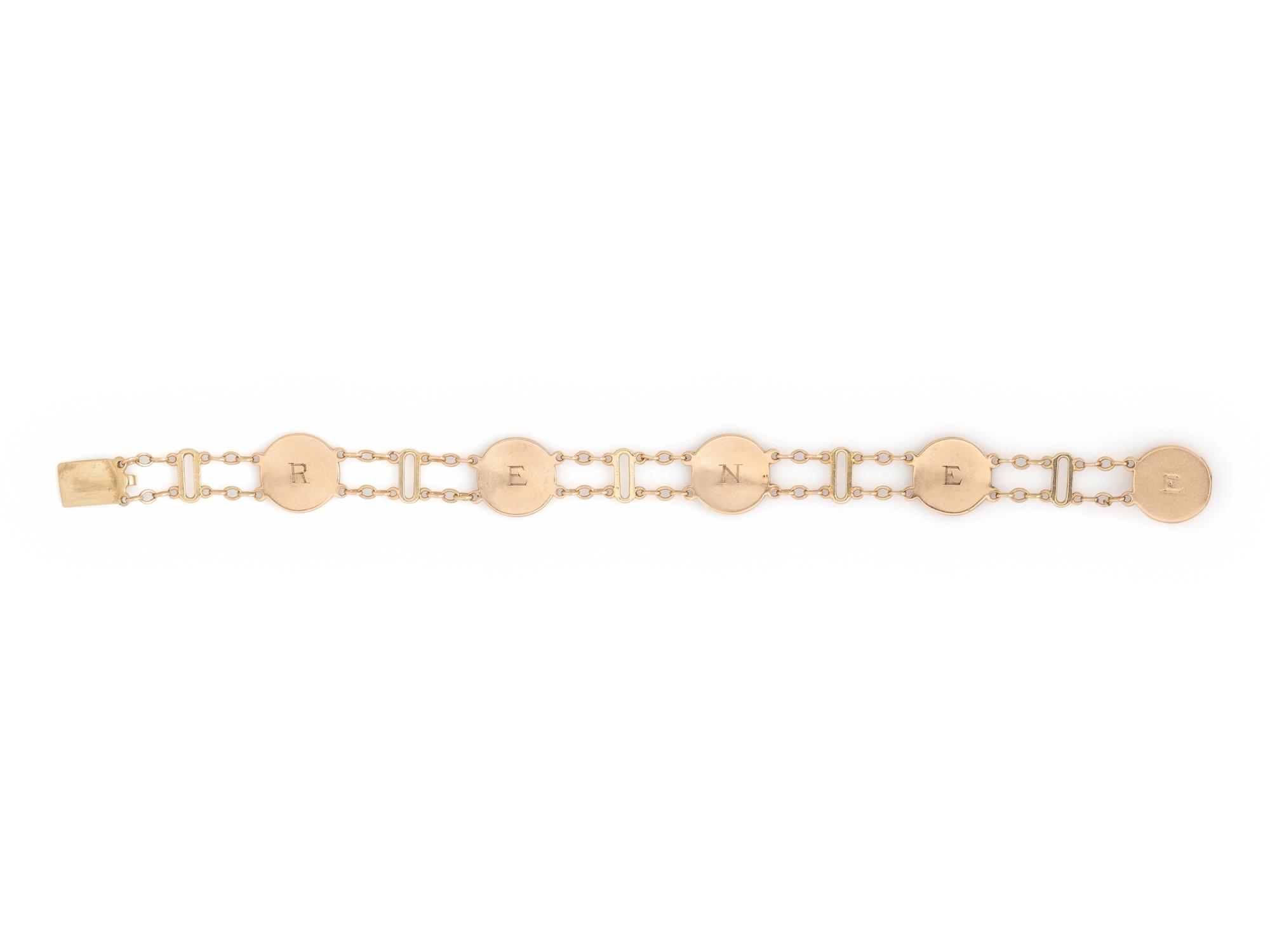 YELLOW GOLD AND ENAMEL NAUTICAL FLAG BRACELET