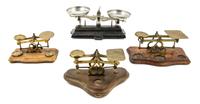 A Group of Three Brass Postal Scales Width of widest 8 inches.