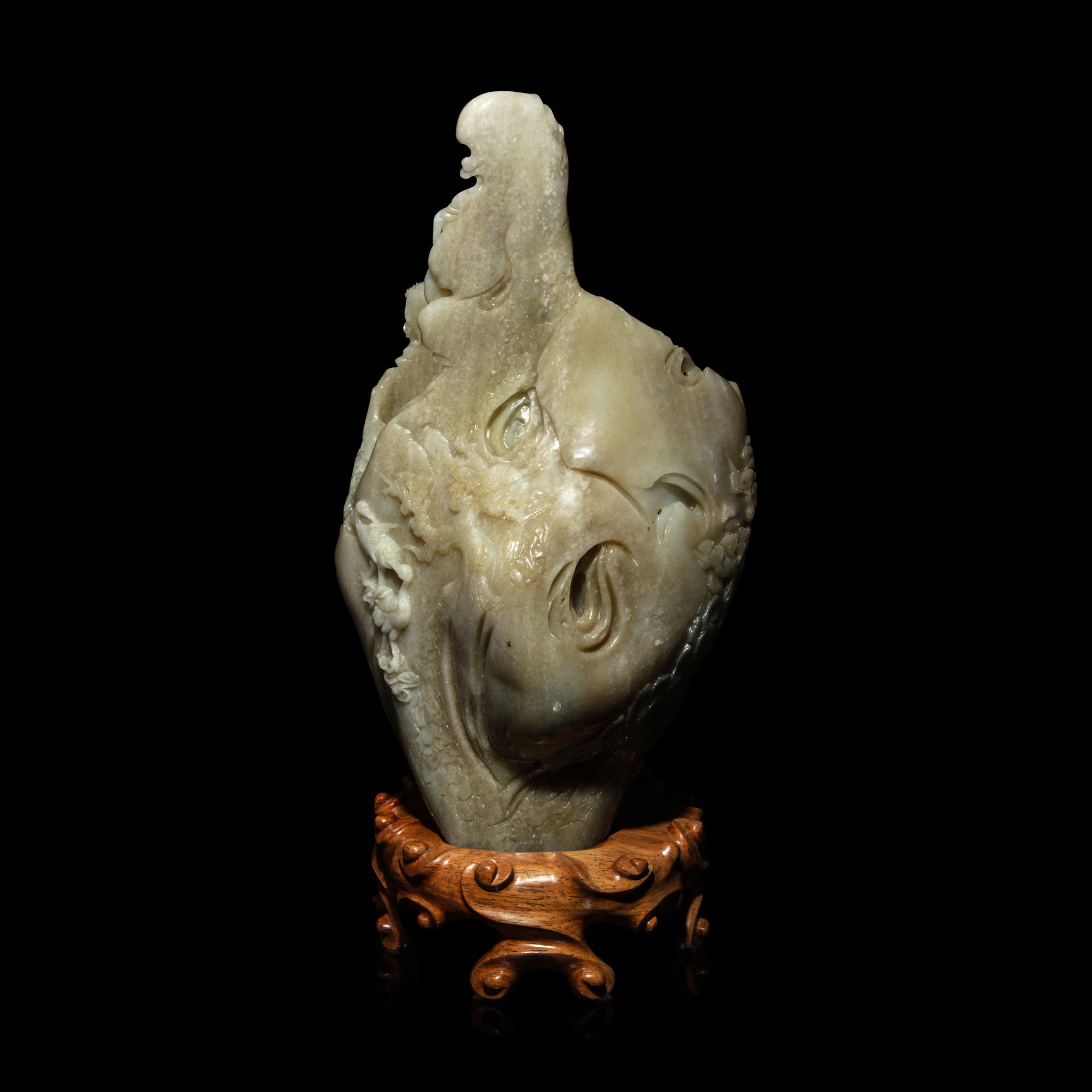 A Chinese Pale Celadon and Russet Jade 'Tree-Trunk' Brushpot, Bitong, 20th Century — 近代 青白玉仿木大筆筒