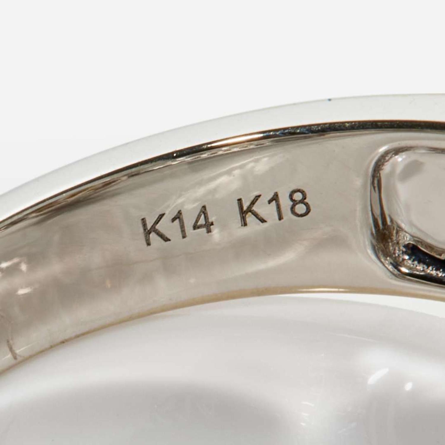 A White Gold, Diamond, and Colored Diamond Ring