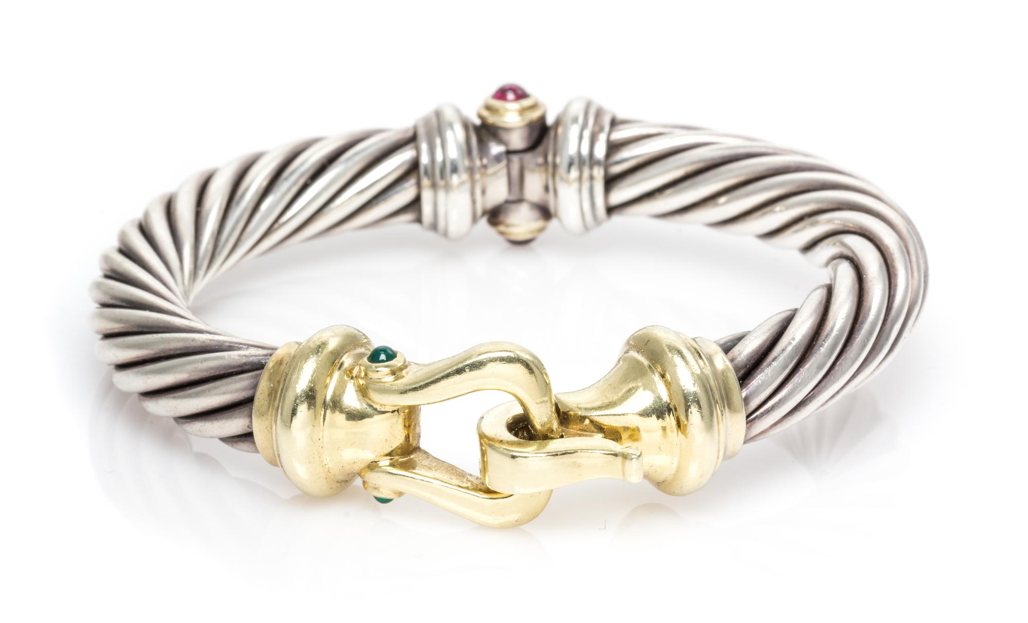 A Sterling Silver, 14 Karat Yellow Gold, Green Onyx and Garnet 'Buckle' Bracelet, David Yurman, 35.70 dwts.