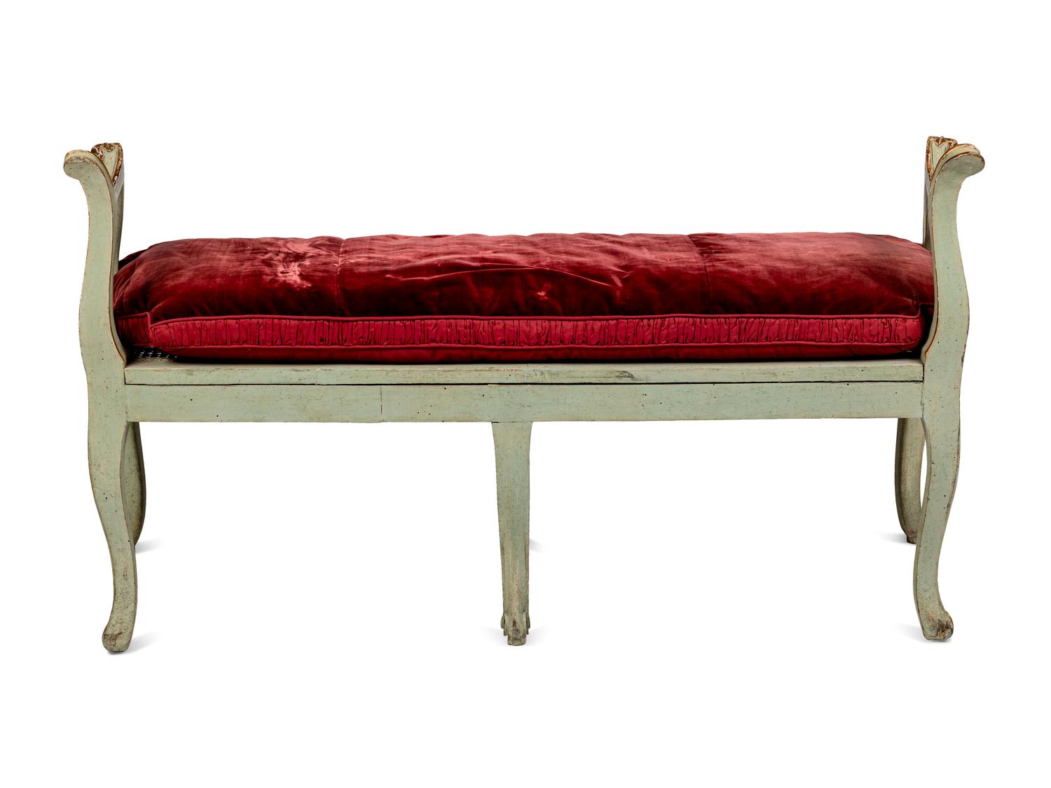 A Pair of Louis XV Green-Painted and Parcel-Gilt Cane Seat Window Benches