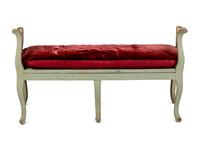 A Pair of Louis XV Green-Painted and Parcel-Gilt Cane Seat Window Benches