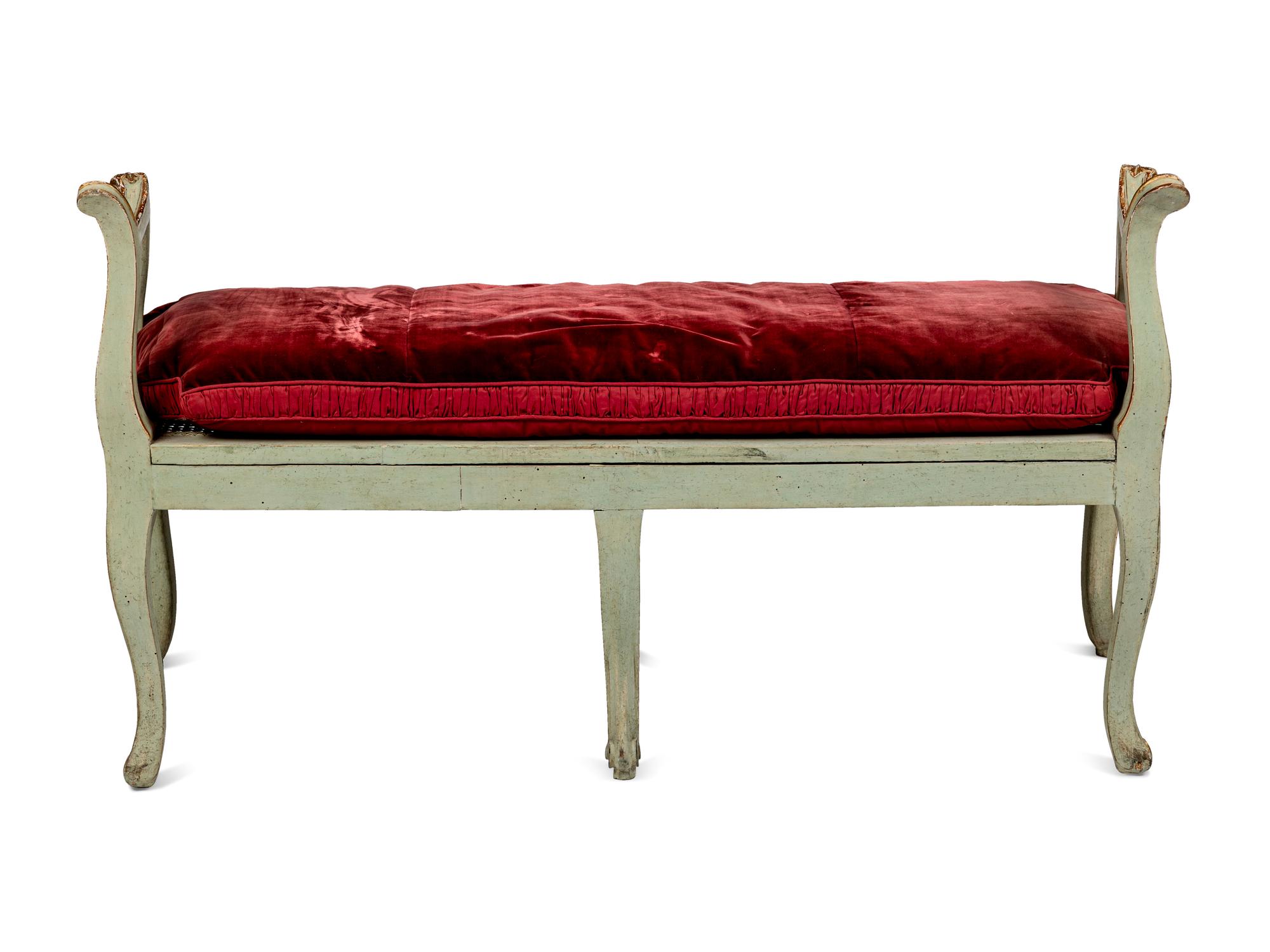A Pair of Louis XV Green-Painted and Parcel-Gilt Cane Seat Window Benches