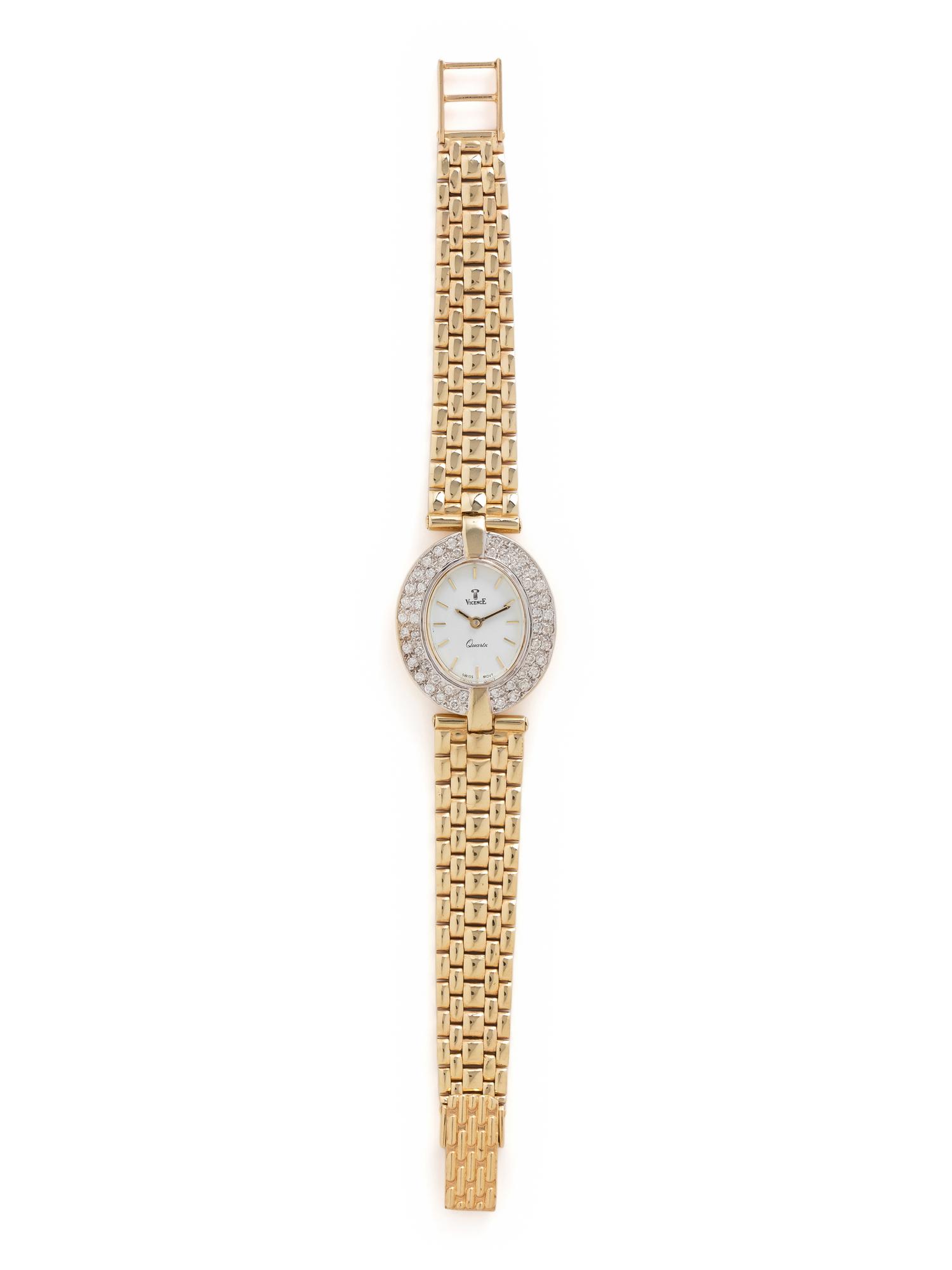 YELLOW GOLD AND DIAMOND WATCH