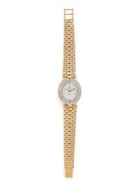 YELLOW GOLD AND DIAMOND WATCH