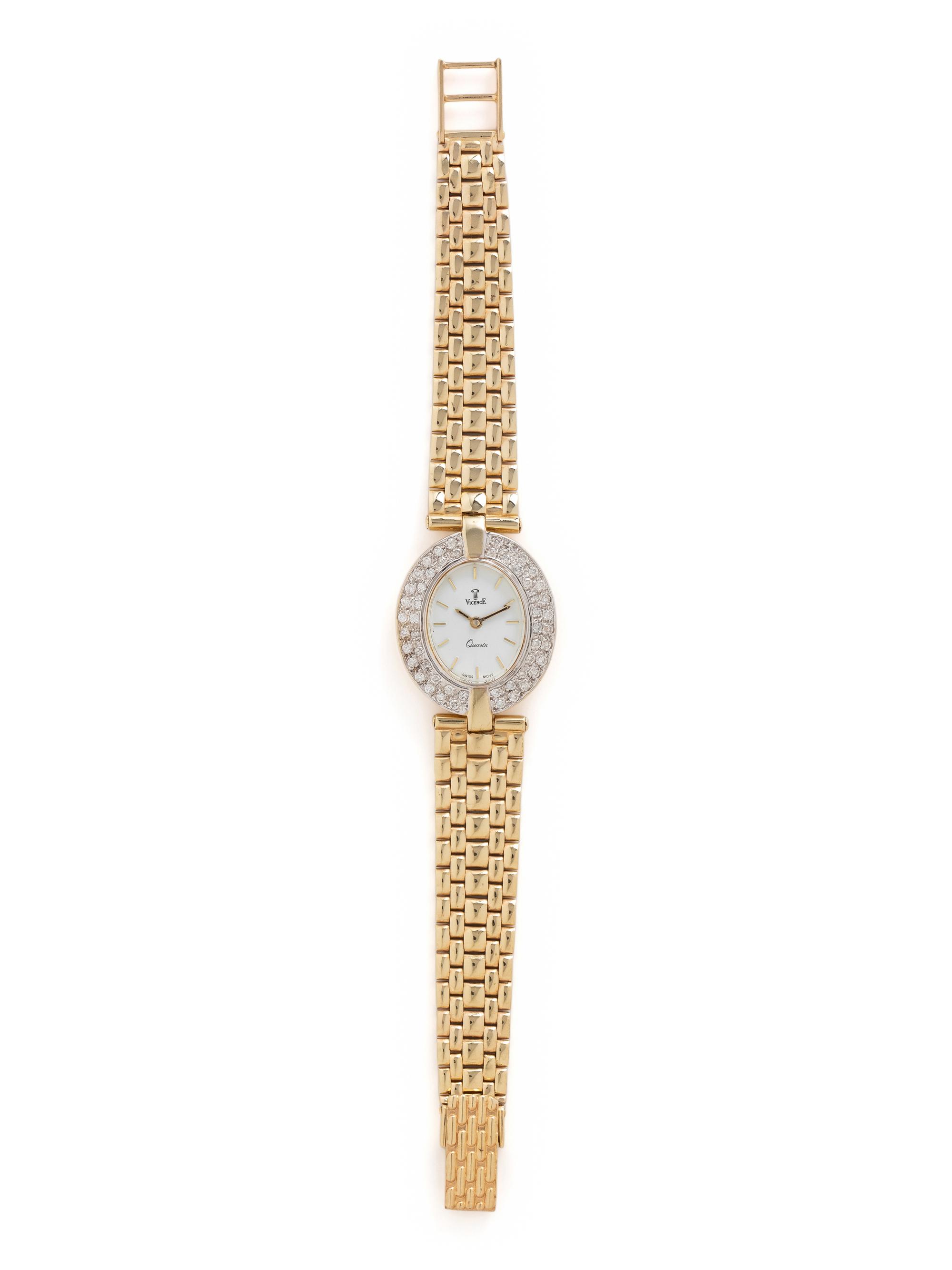 YELLOW GOLD AND DIAMOND WATCH