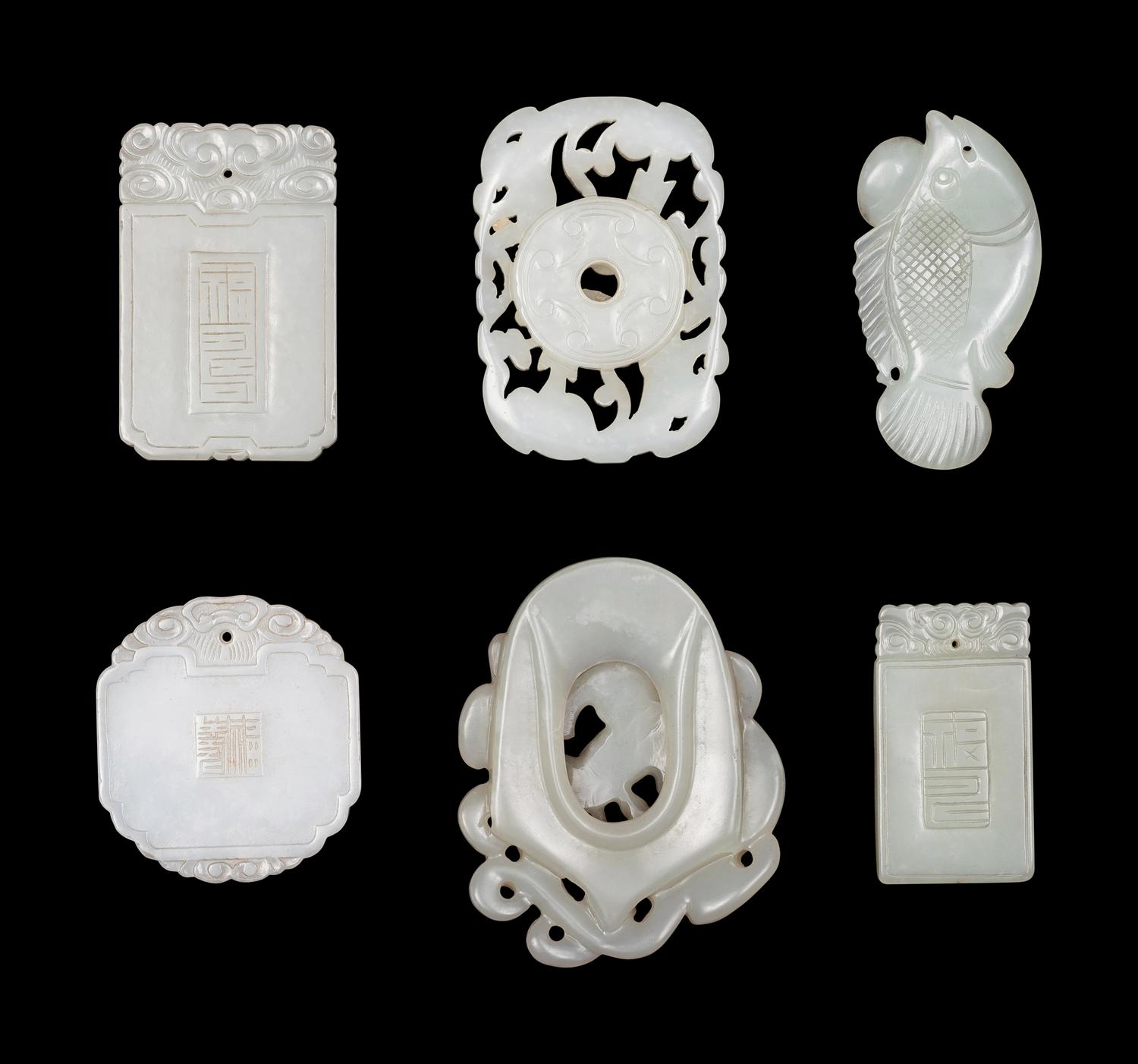 Five Chinese Carved Celadon Jade Pendants