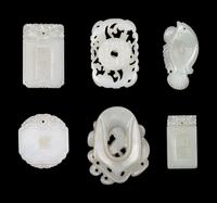 Five Chinese Carved Celadon Jade Pendants