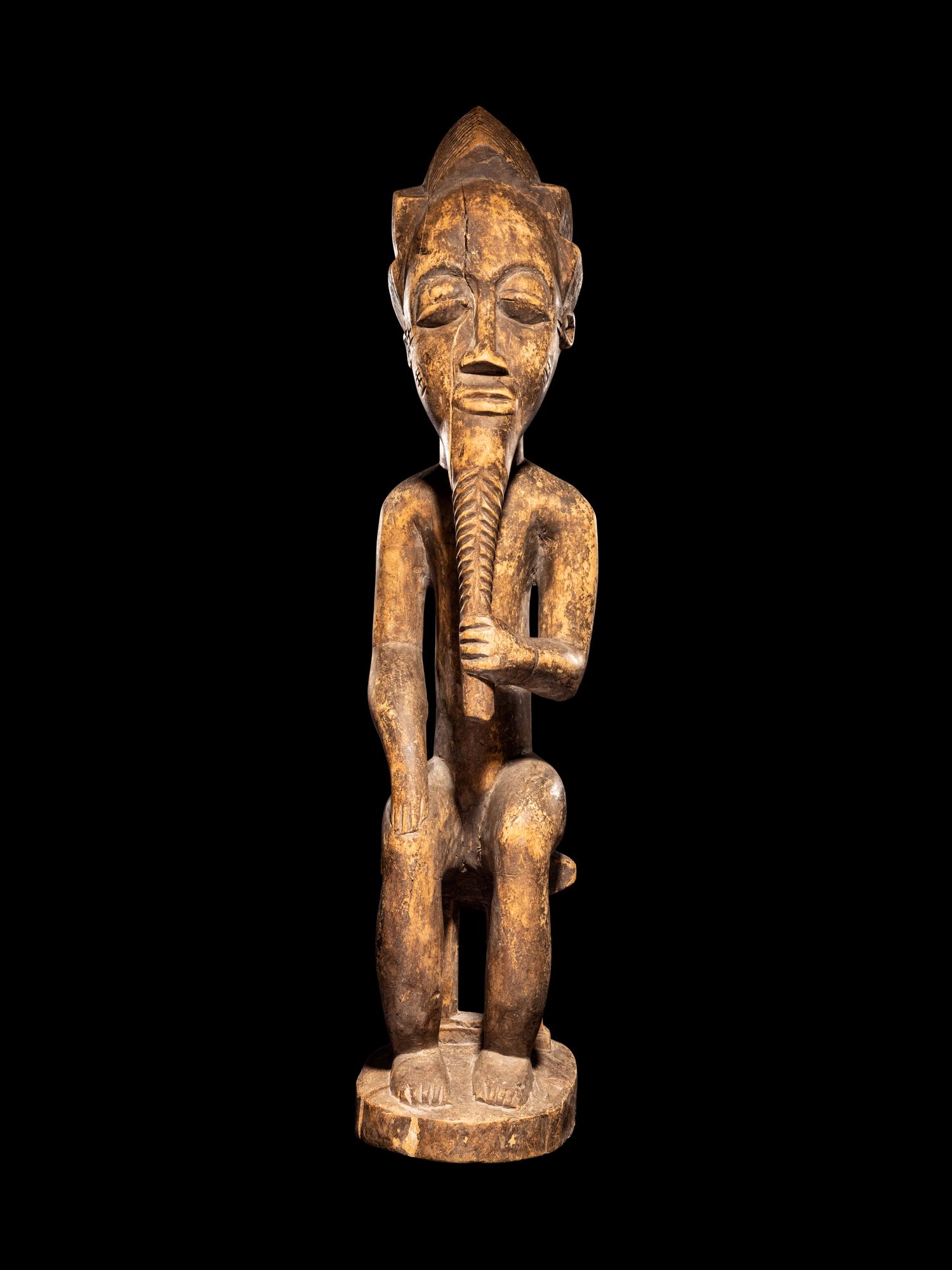 An African Wood Male Figure
