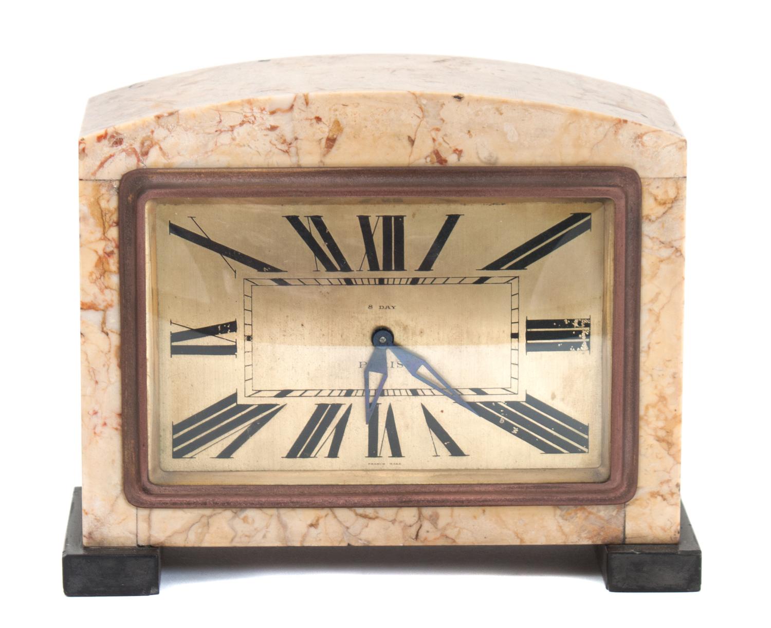 An Art Deco Marble 8-Day Clock Height 5 7/8 inches. — CIRCA 1920-1940