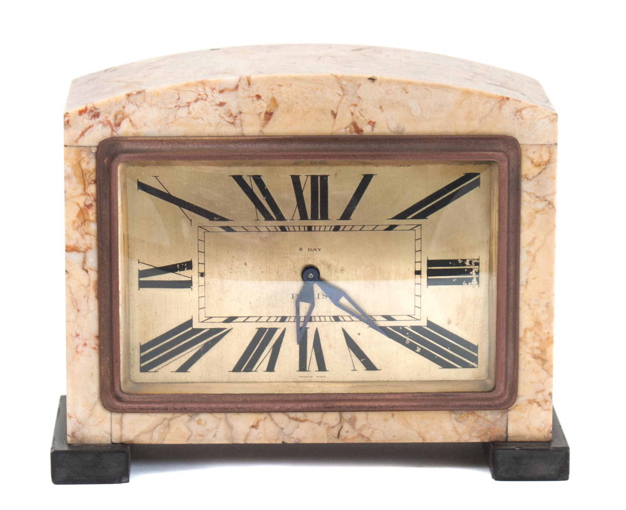 An Art Deco Marble 8-Day Clock Height 5 7/8 inches. — CIRCA 1920-1940