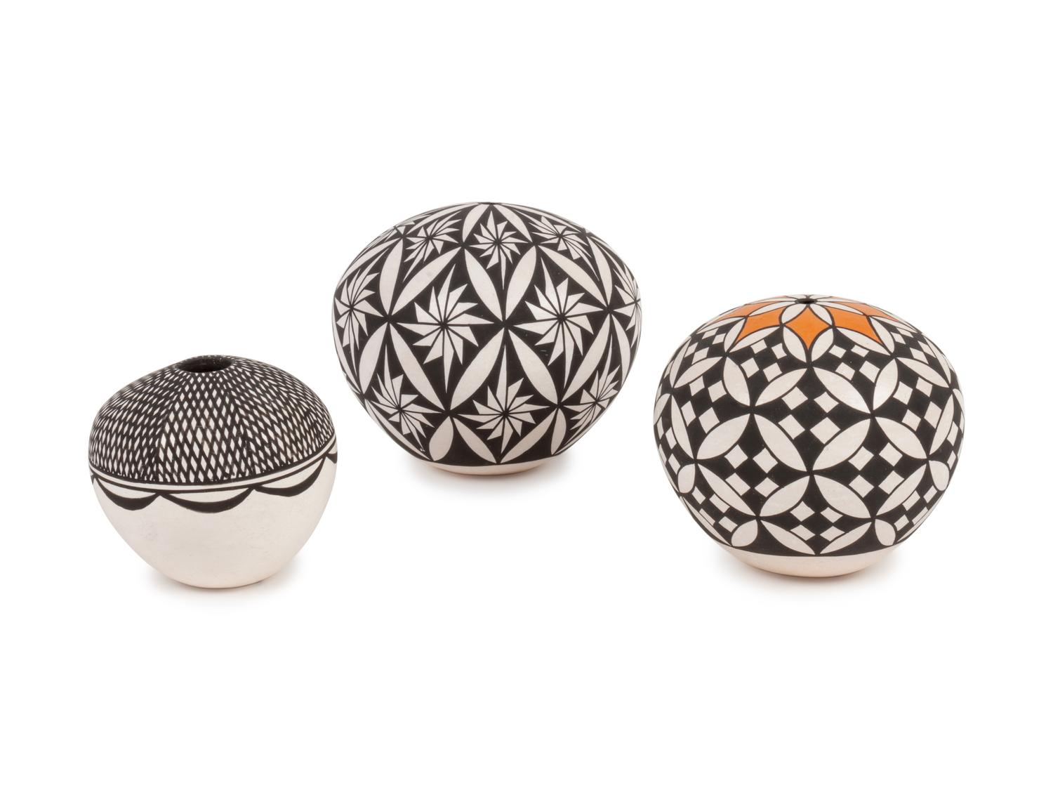 Three Black and White Seed Jars