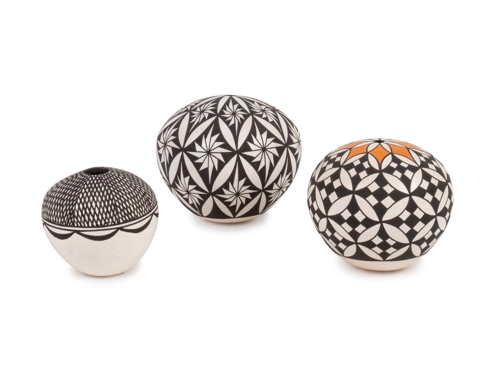 Three Black and White Seed Jars