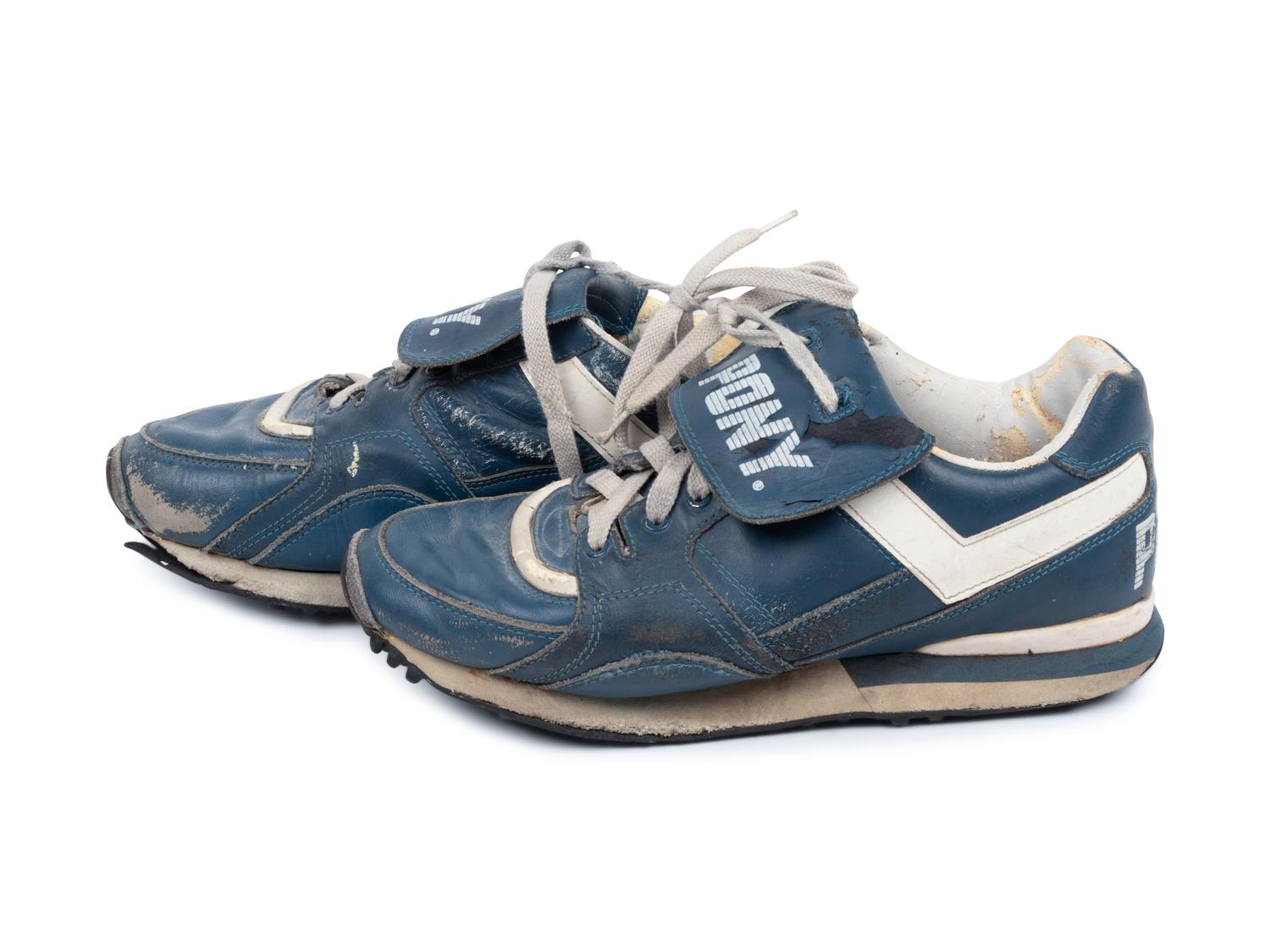 A Pair of Greg Maddux Game Used Pony Cleats,