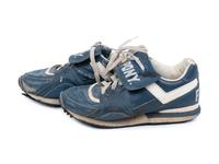 A Pair of Greg Maddux Game Used Pony Cleats,