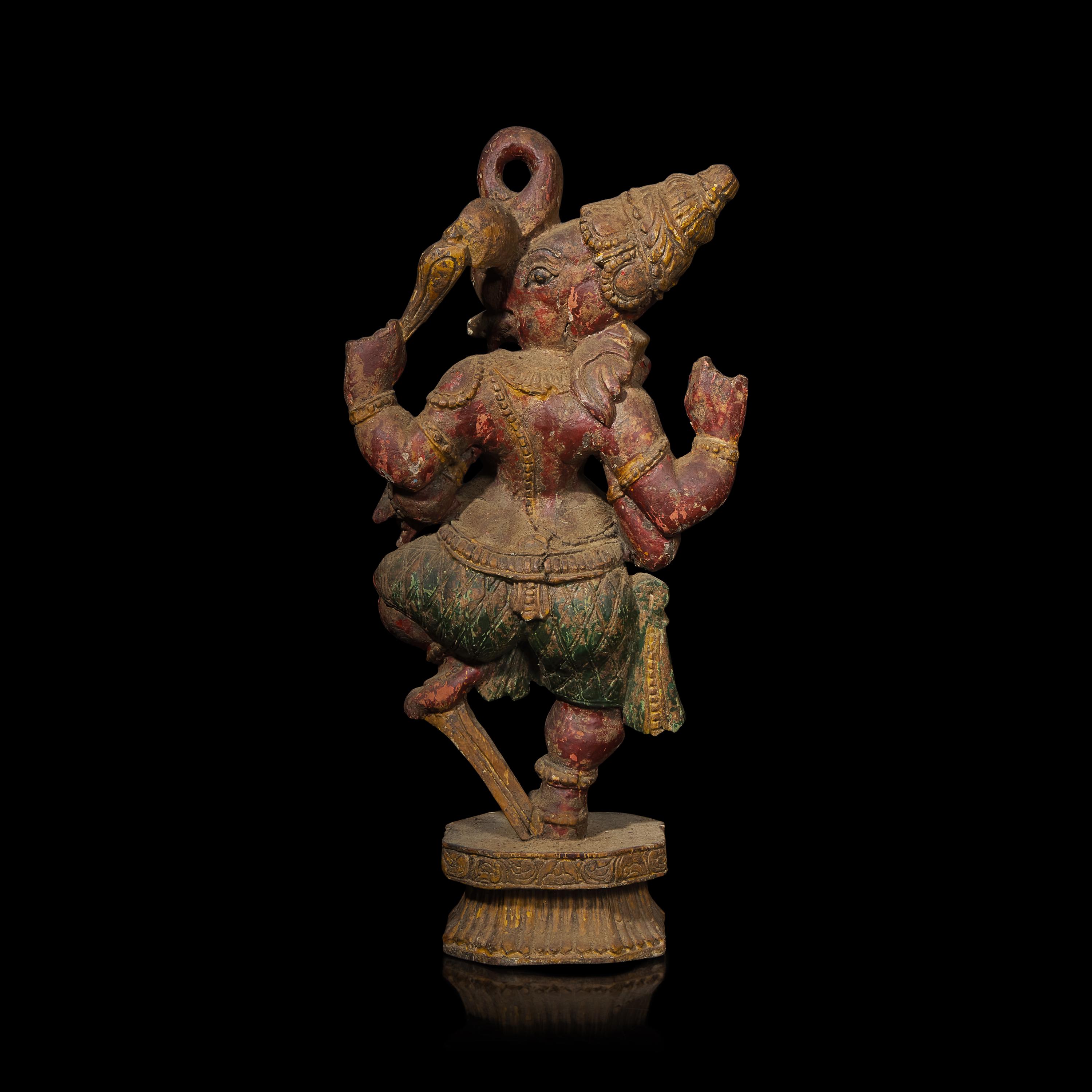 An Indian Carved and Polychromed Wood Figure of Ganesh, Late 19th to Early 20th Century