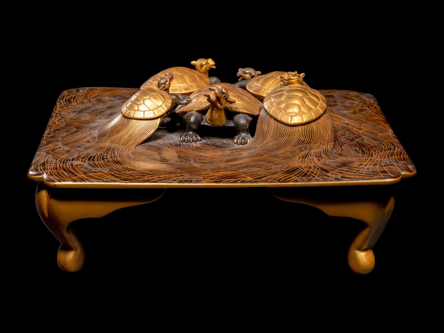 A Japanese Gold and Black Lacquer 'Dragon Turtle' Square Stand