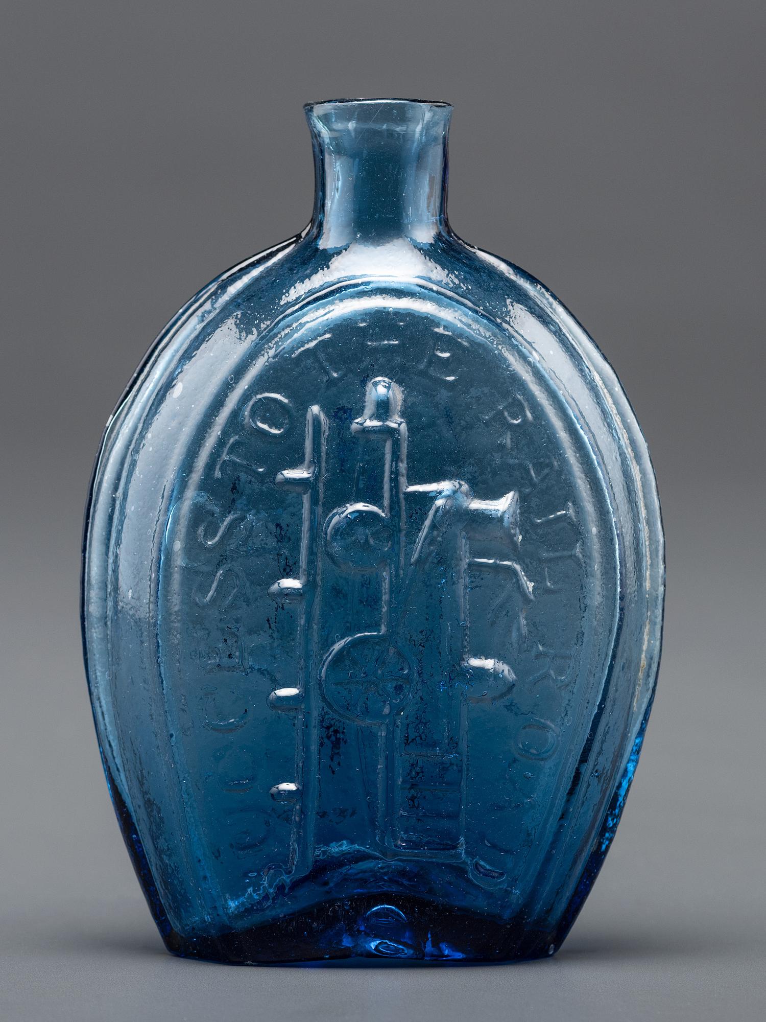 A New York Molded-Glass Flask in Light Sapphire Blue by Lancaster Glass Works