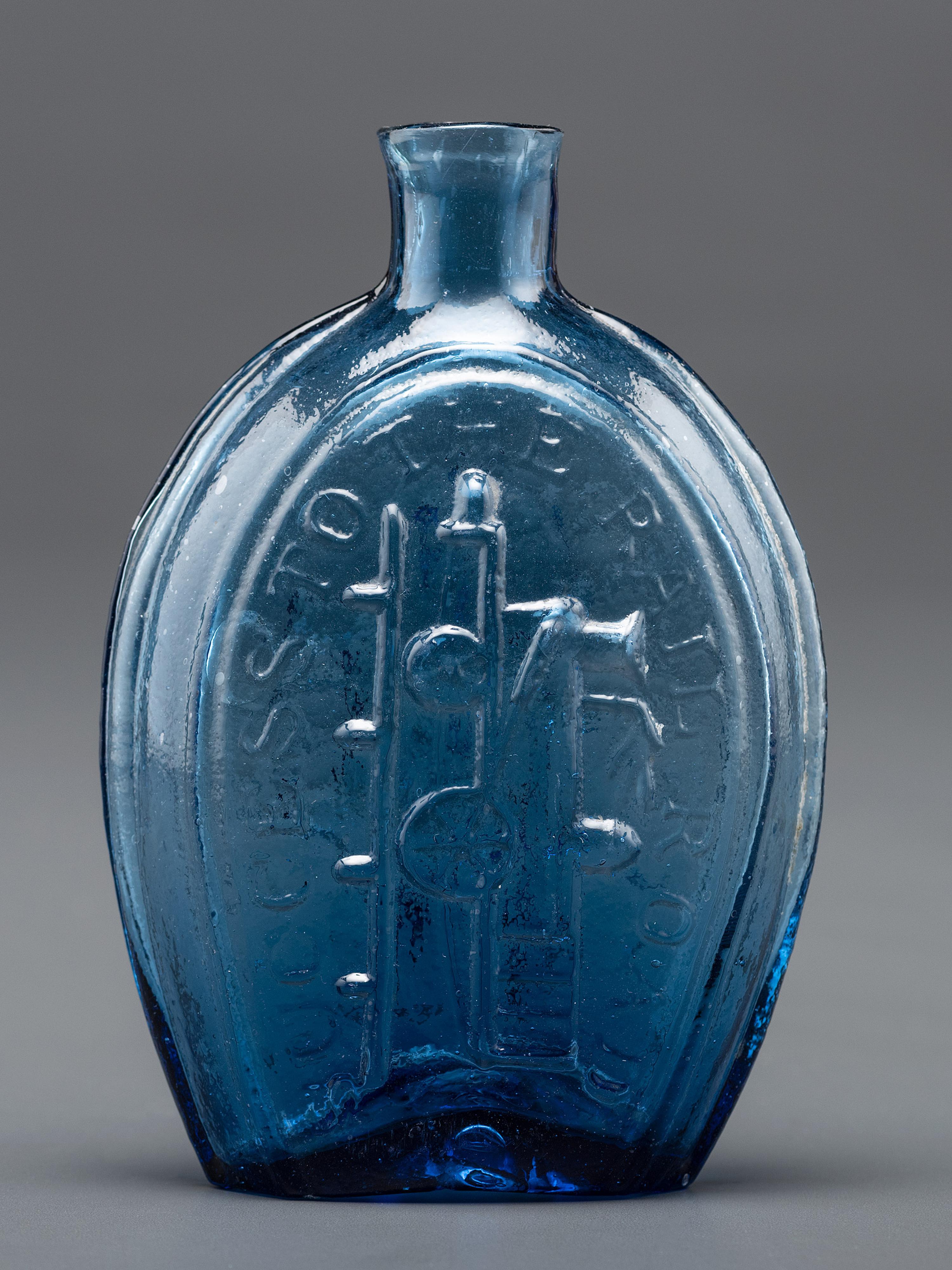 A New York Molded-Glass Flask in Light Sapphire Blue by Lancaster Glass Works