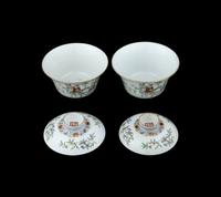 A Pair of Chinese Famille Rose Porcelain Covered Tea Bowls and Undertrays