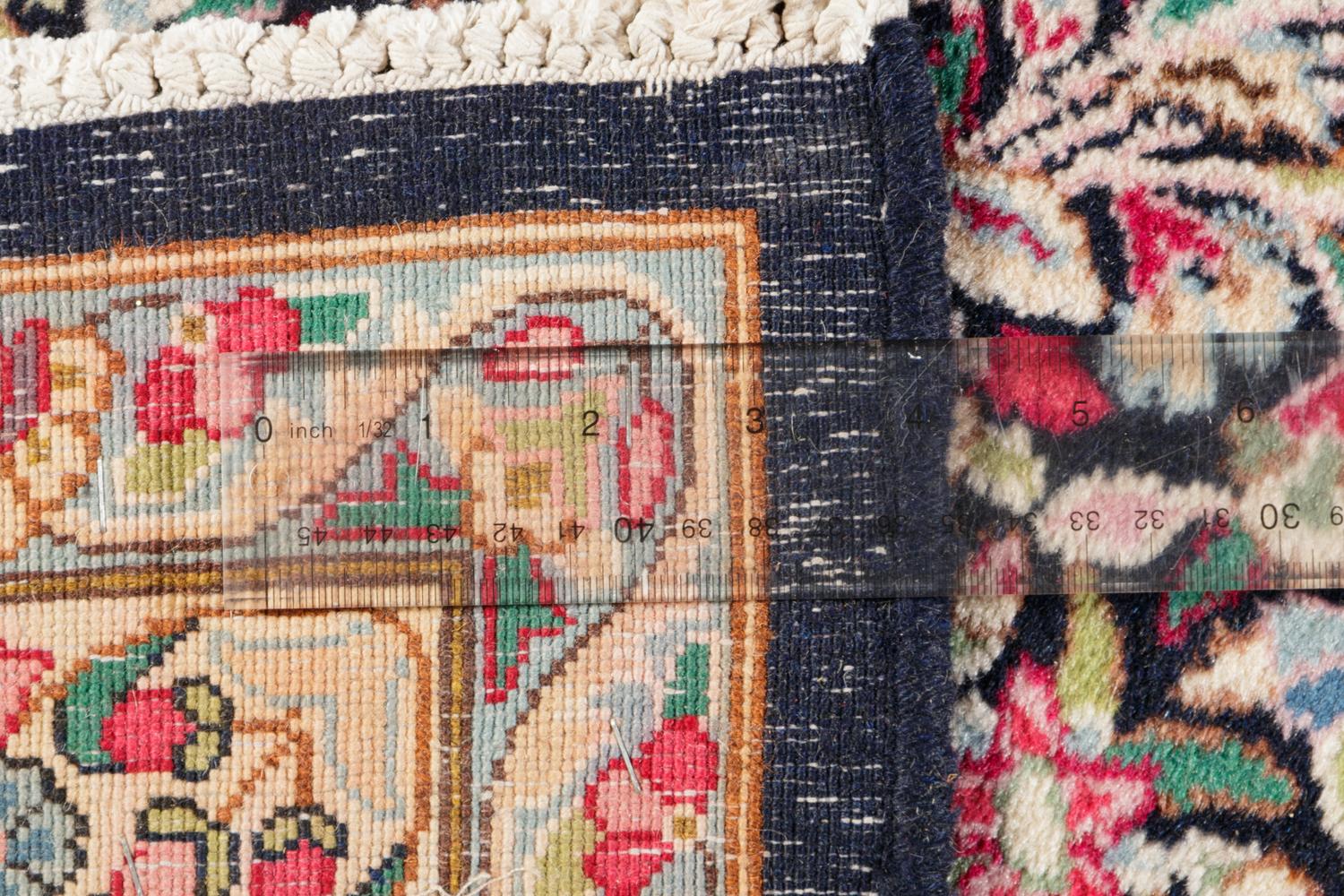 A Kirman Wool Rug