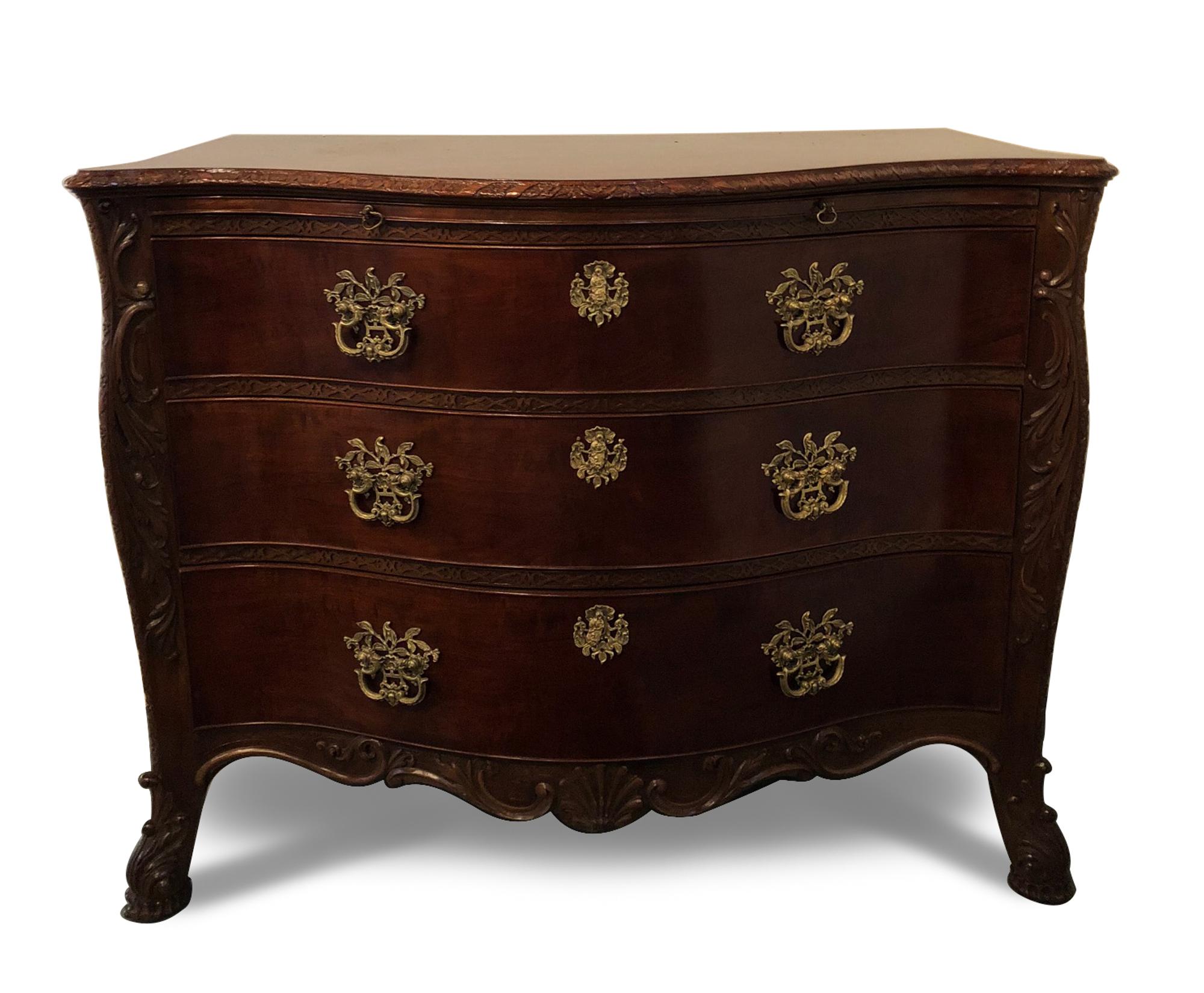 A George II Style Carved Mahogany Serpentine Fronted Chest of Drawers Height 35 3/4 x width 44 x depth 21 inches. — 19TH CENTURY