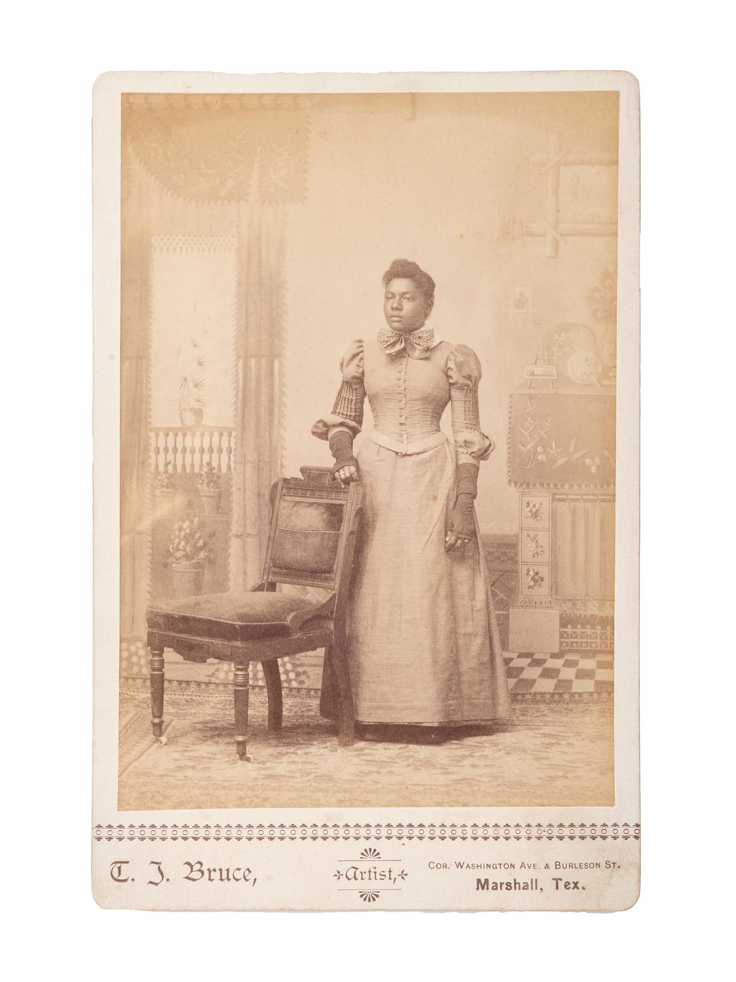 [EARLY PHOTOGRAPHY] -- [WESTERN AMERICANA]. BRUCE, T.J., photographer. Cabinet card of African American woman. Marshall, TX.