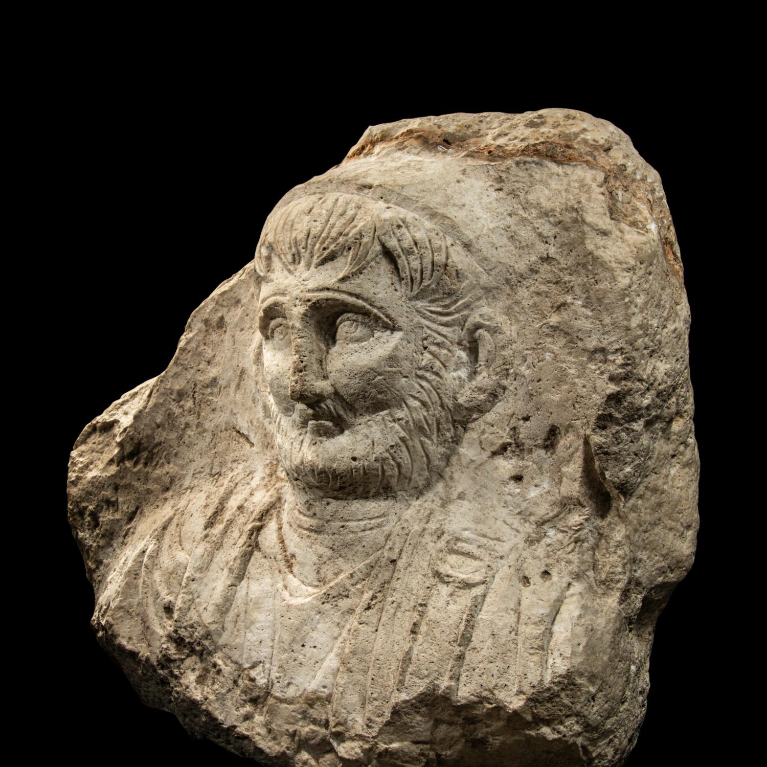 A Palmyrene Limestone Bust of a Man